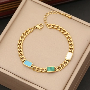 Gold chain bracelet with blue, malachite green, and white rectangular stone charms