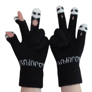 Black knitted gloves with skull pattern fingertips and touchscreen-ready open finger design