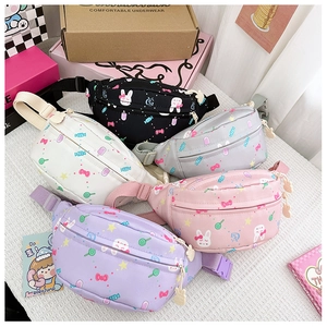Detailed top view of assorted mini printed kids waist bags in multiple colors and patterns