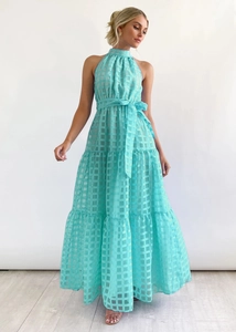Detail view of light blue plaid halter dress with tiered skirt and waist tie