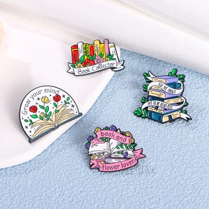 Set of 4 creative floral and book enamel pins for backpacks and clothes accessories