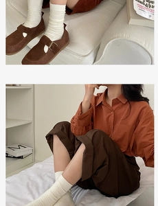 Detail of cream ribbed socks paired with brown Mary Jane shoes and wide-leg pants