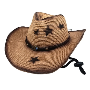 Vintage western cowboy straw hat with star patterns and Hamsa hand pendant charm