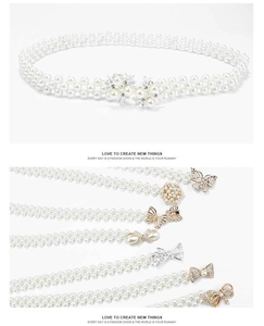 Detail of elegant pearl waist chains with rhinestone flower and bow metal buckles