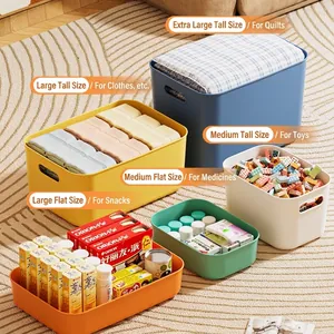 Large stackable plastic storage boxes with lids and handles in vibrant colors for home