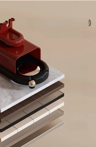 Detail of suction cup wall mount adhesive showing strong grip on marble and wood surfaces