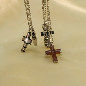 Titanium steel cross and cylinder pendant necklace set with silver and black finishes