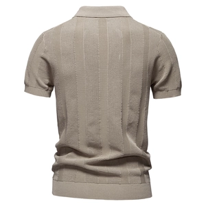 Detail of the vertical stripe texture and knitted fabric on the back of this tan Polo shirt