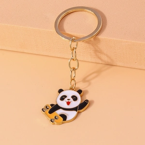 Cute cartoon panda on skateboard keychain accessory with gold alloy ring and enamel finish