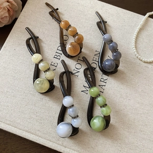 Set mit fünf eleganten Harz-Haarspangen mit Marmorperlen und kleinen Strasssteinen