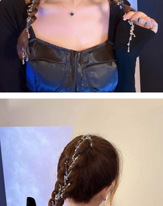 Detail of star-shaped beads on a metal hair chain woven into a braided hairstyle