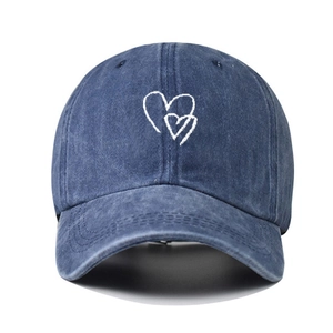 Classic washed blue denim baseball cap with white embroidered double hearts for women and men