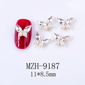 Detail of 3D butterfly nail charms with rhinestones and pearls, size 11x8.5mm
