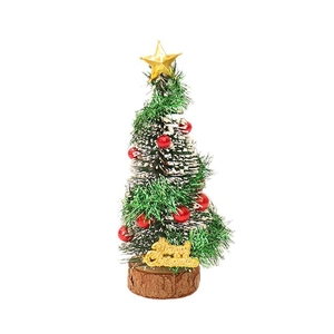 Miniature dollhouse Christmas tree with red baubles and golden star on a wooden base