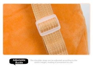 Detail of adjustable khaki woven strap and plastic buckle on orange plush kids backpack