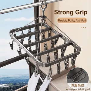 Aluminum multi-clip laundry rack for socks shown on a bright balcony with strong grip