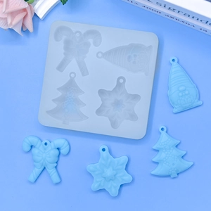 Christmas silicone mold set for resin pendants featuring gnome tree and snowflake shapes