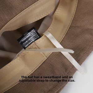 Close-up detail of women's linen sun hat interior featuring sweatband and adjustment string