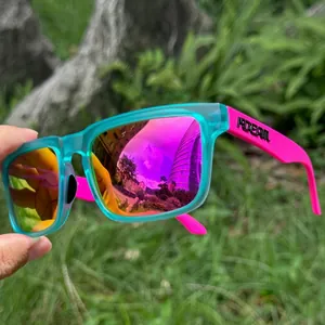 Close-up of KDEAM polarized sports sunglasses with purple lenses and cyan frame