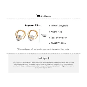 Macro detail of sparkling cubic zirconia spiral earrings with size 1.6cm by 1.5cm markings
