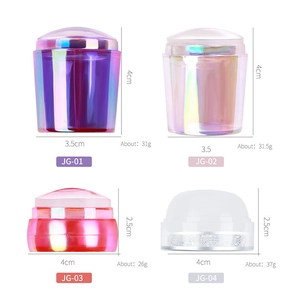 Comparison of different sizes silicone nail stamper tools with iridescent plated bases