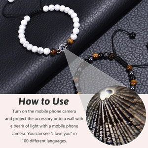 Detailed view of projection beads showing I Love You in 100 languages for beaded bracelets