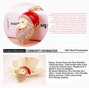 Detail of Santa Claus keychain with sparkling rhinestones and golden zinc alloy finish