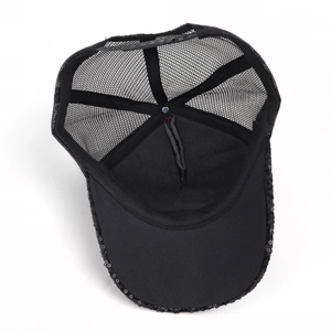 Close-up of black sequined baseball cap with breathable mesh and adjustable strap