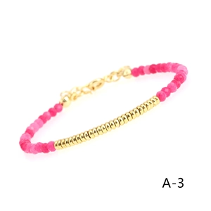 Detail of beaded bracelet with gold beads, rose chalcedony, and adjustable lobster clasp