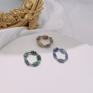 Three-piece set of vintage natural stone stretch rings with colorful beads and metal accents