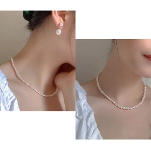 Nahaufnahme Detail der natürlichen Süßwasser Perle Schlüsselbeinkette, eleganter Schmuck.
