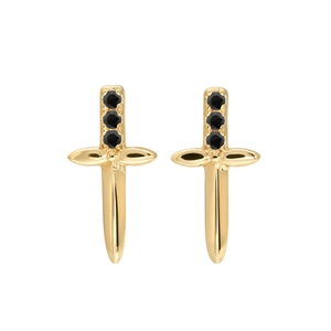 Close-up of golden sword earrings with black gemstones on a white background