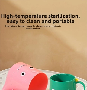 Close-up of cute cartoon dinosaur mouthwash cups with pink and green integrated molding