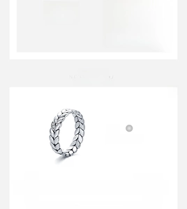 Detailed close-up of woven leaf pattern on 925 sterling silver ring showing texture