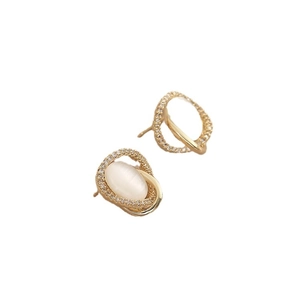 Elegant gold opal stud earrings with shimmering halo diamonds on a clean white background