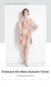 Detail of floral print patchwork dress featuring a matching wide waist belt and long sleeves