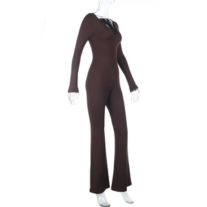 Side view of dark brown long sleeve bodysuit with deep V-neck and slim fit athletic fabric