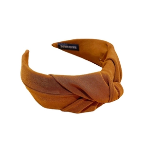 Brown wide fabric knot headband for women featuring a minimalist handmade texture finish