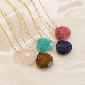 Minimalist stainless steel necklaces with pear-shaped natural gemstone pendants on silk
