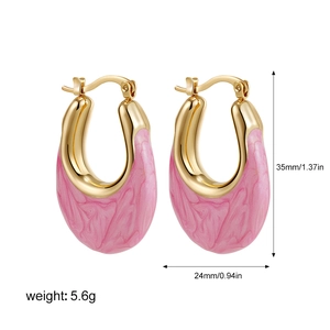 Detailed view of U-shaped gold enamel earrings showing 35mm height and 24mm width