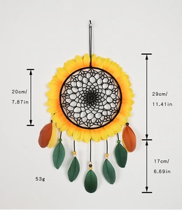Detailed view of sunflower dream catcher with feather accents and dimensions 20cm by 29cm
