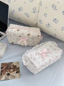Quilted bear floral storage pouches with ribbon bow decoration for stationery or makeup