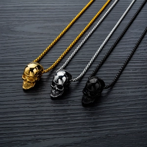 Classic stainless steel skull pendants in gold, silver, and black on box chains