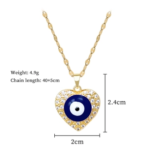 Detailed view of evil eye heart pendant with blue enamel and zircon stones, 4.9g weight