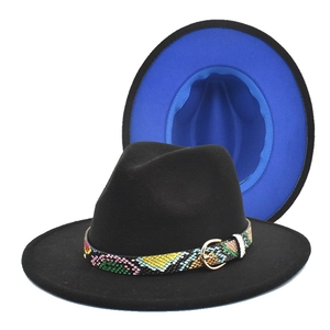 Detail of two-tone fedora hat with black exterior, blue interior and snakeskin band