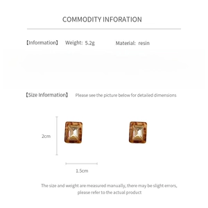 Detail view showing resin square earrings dimensions 2cm x 1.5cm and 5.2g weight