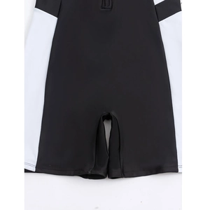 Detail of color-block sporty one-piece swimsuit with front zipper and neat stitching