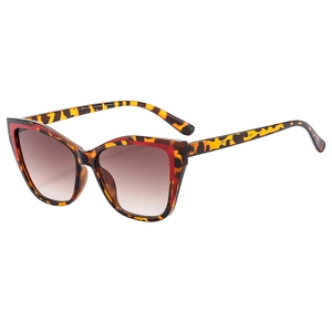 Stylish cat-eye sunglasses with tortoiseshell frames and brown gradient lenses