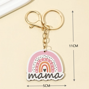 Detail showing the 11cm leopard print mama keychain with a rainbow wooden pendant