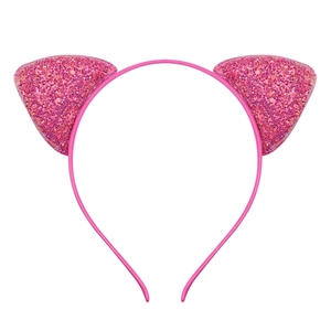 Detail of pink cat ear headband with shiny sequins and glitter finish on a white background
